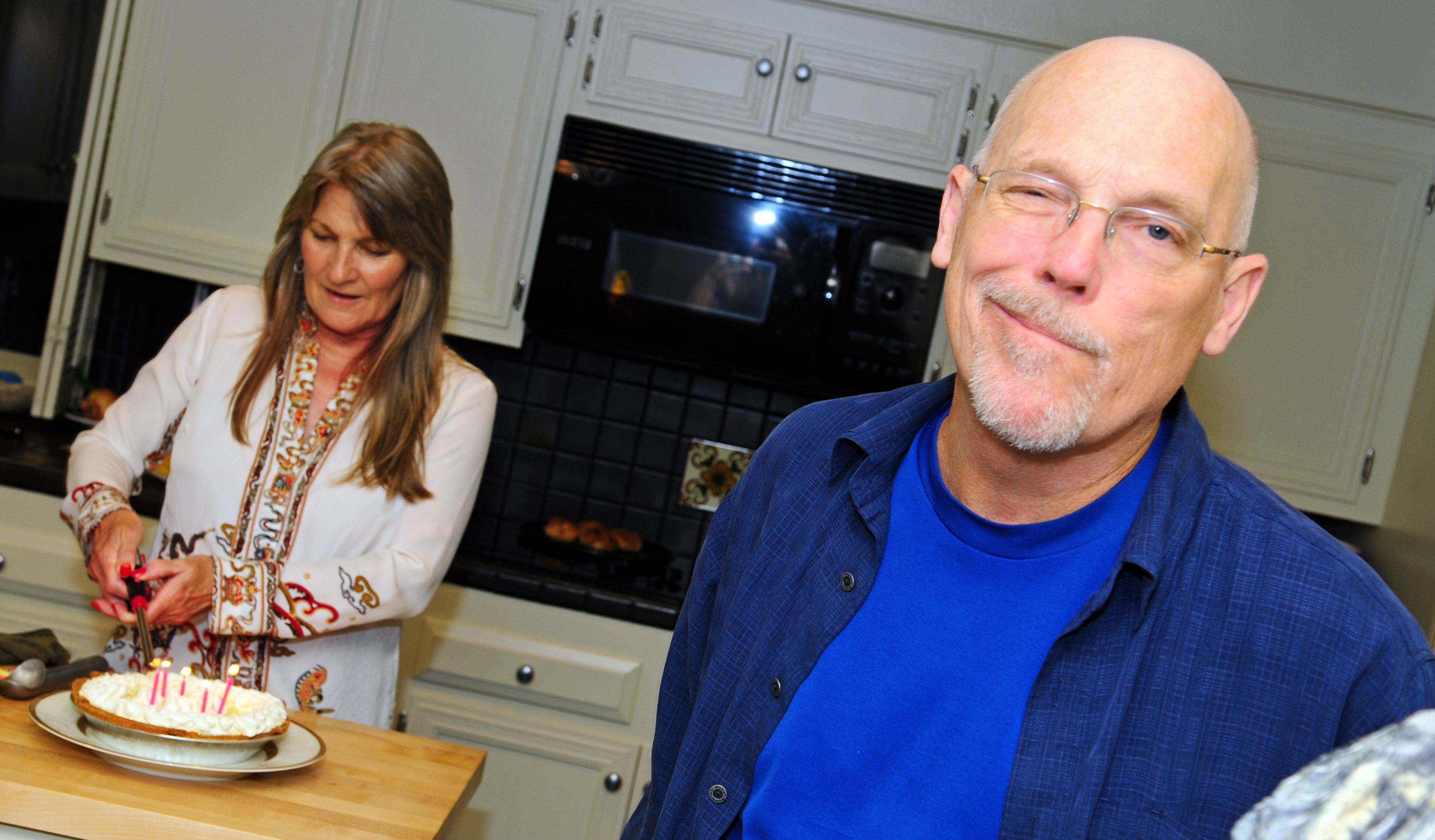 P and Jeneth with birthday cake and smirk